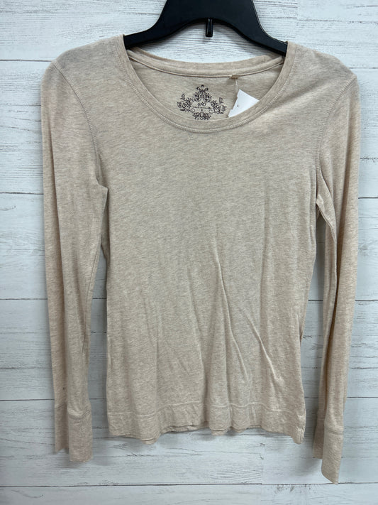 Size M wear to declare Tan Shirt