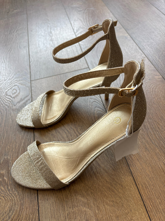 7.5 N/A Gold Shoe